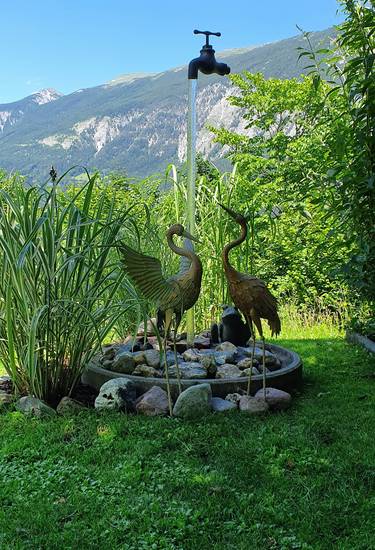 magischer Brunnen für den Gartenteich